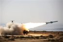 An Iranian long-range shore-to-sea missile called Qader (Capable) is launched during Velayat-90 war game on Sea of Oman's shore