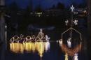 A Christmas-light nativity scene is pictured in the flood waters of the Snoqualmie River at NE Woodenville Duvall Road in Duvall, Washington