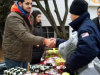 In this photo provided by Sportstars, football player Oday Aboushi, left, helps distribute presents to people affected by Superstorm Sandy in the Staten Island borough of New York, Saturday, Dec. 22, 2012. Aboushi, an NCAA college football offensive lineman from Virginia and potential first-round pick in the NFL draft, returned to a neighborhood he once hung out in while growing up in New York to lend a hand to nearly 1,000 residents in need of food, clothing and supplies. (AP Photo/Sportstars, Emil Boccio)
