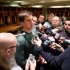 Green Bay Packers quarterback Aaron Rodgers answers questions from the media inside the locker room at Lambeau Field on Friday, April 26, 2013, in Green Bay, Wis., after the announcement of his contract extension with the NFL football team. (AP Photo/The Green Bay Press-Gazette,  Lukas Keapproth) NO SALES