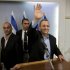 Israeli Defense Minister Ehud Barak waves to media after a conference in Tel Aviv, Monday, Nov. 26, 2012. Barak shook up the Israeli political system Monday with the abrupt announcement that he is quitting politics and will not run in general elections in January. The defense minister made the surprise announcement even after polls showed his breakaway Independence Party gaining momentum after Israel's recent military offensive in the Gaza Strip. (AP Photo/Oded Balilty)