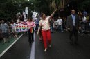 New York mayoral candidate Christine Quinn marches in the Gay Pride Parade in New York