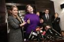 Shalabayeva talks next to her daughter Madina during a news conference in Rome