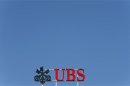 The logo of Swiss bank UBS is seen on an office building in Zurich