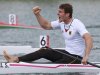 Sebastian Brendel of Germany celebrates after finishing first in the Final A of men's canoe single (C1) 1000m final at Eton Dorney at the London 2012 Olympics Games near London
