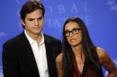 Actors Ashton Kutcher and Demi Moore announce the launch of their "Real Men" campaign at a news conference during the Clinton Global Initiative in New York