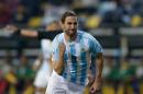 Argentina's Gonzalo Higuain celebrates after scoring against Jamaica during a Copa America Group B soccer match at the Sausalito Stadium in Vina del Mar, Chile, Saturday, June 20, 2015. (AP Photo/Jorge Saenz)