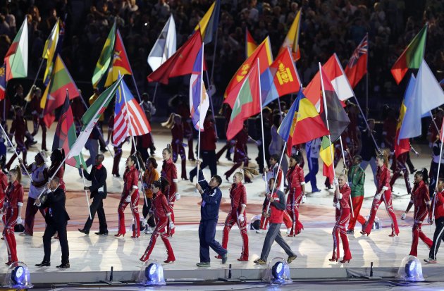 Flagbearers take part in the athletes' march during the closing ceremony of the London 2012 Olympic Games at the Olympic Stadium