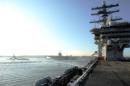 Aircraft carrier USS Dwight D. Eisenhower departs Naval Station Norfolk ahead of Hurricane Irene