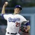 Los Angeles Dodgers starter Zack Greinke pitches to the Washington Nationals in the first inning of a baseball game in Los Angeles, Wednesday, May 15, 2013. (AP Photo/Reed Saxon)