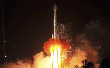 The Long March-3B rocket carrying the Chang'e-3 lunar probe blasts off from the launch pad at Xichang Satellite Launch Center