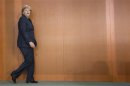 German Chancellor Angela Merkel arrives at a cabinet meeting at the Chancellery in Berlin