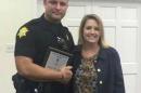 Richland County Sheriff's Department Officer Senior Deputy Ben Fields is pictured with Karen Beaman, Principal of Lonnie B. Nelson Elementary School in Columbia South Carolina