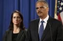 United States Attorney General Holder holds a news conference announcing updates on investigation of Brown shooting in Ferguson Missouri, in Washington