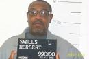 FILE - In this Dec. 13, 2011 file photo released by the Missouri Department of Corrections is death-row inmate Herbert Smulls who is scheduled to die by injection one minute after midnight Wednesday, Jan. 29, 2014 for killing St. Louis County jeweler Stephen Honickman in 1991. The U.S. Supreme Court has granted a stay of execution for Missouri death row inmate Herbert Smulls, Tuesday, Jan. 28, 2014. Justice Samuel Alito signed the order that was sent out Tuesday night after President Barack Obama's State of the Union speech. (AP Photo/Missouri Department of Corrections)