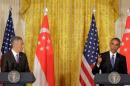 U.S. President Barack Obama and Singapore Prime Minister Lee Hsien Loong speak during a news conference at the White House in Washington.