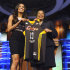 FILE - In this April 15, 2013, file photo, Notre Dame's Skylar Diggins holds up a Tulsa Shock jersey with WNBA President Laurel J. Richie after the Shock selected Diggins as the No. 3 oberall pick in the WNBA basketball draft in Bristol, Conn.  The star guard at Notre Dame and No. 3 pick in the draft was introduced by the Shock on Saturday.  (AP Photo/Jessica Hill, File)