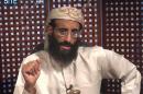 FILE - In this image taken from video and released by SITE Intelligence Group on Monday, Nov. 8, 2010, Anwar al-Awlaki speaks in a video message posted on radical websites. On Friday, April 4, 2014, U.S. District Judge Rosemary Collyer dismissed a lawsuit against Obama administration officials for the 2011 drone-strike killings of three U.S. citizens in Yemen, including U.S.-born al-Qaida leader al-Awlaki. Collyer said the case raises serious constitutional issues and is not easy to answer, but that "on these facts and under this circuit's precedent," the court will grant the Obama administration's request. (AP Photo/SITE Intelligence Group, File) NO SALES, MANDATORY CREDIT