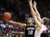 Bryant's Dyami Starks (12) shoots against Indiana's Cody Zeller during the first half of an NCAA college basketball game, Friday, Nov. 9, 2012, in Bloomington, Ind. (AP Photo/Darron Cummings)