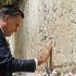 Republican presidential candidate and former Massachusetts Gov. Mitt Romney pauses as he visits the Western Wall in Jerusalem, Sunday, July 29, 2012. (AP Photo/Charles Dharapak)