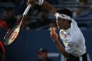Kei Nishikori, of Japan, serves to Ivo Karlovic, of Croatia, during the fourth round of the U.S. Open tennis tournament, Monday, Sept. 5, 2016, in New York. (AP Photo/Jason DeCrow)