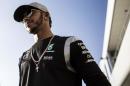 Mercedes driver Lewis Hamilton of Britain looks on after talking to the media during the Formula One Japanese Grand Prix in Suzuka on October 6, 2016