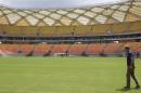 United States national soccer team coach Klinsmann of Germany inspects the field of the Arena Amazonia stadium in Manaus