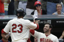 Cleveland Indians' Jason Kipnis, right, congratulates Michael Brantley after Brantley hit a two-run home run off Detroit Tigers relief pitcher Al Alburquerque in the eighth inning of a baseball game, Sunday, July 7, 2013, in Cleveland. Nick Swisher scored. The Indians won 9-6. (AP Photo/Tony Dejak)