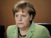 German Chancellor Angela Merkel reacts as she arrives for the weekly cabinet meeting at the chancellery in Berlin, Germany, Wednesday, June 6, 2012. (AP Photo/Markus Schreiber)