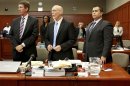 Defense attorneys Mark O'Mara, left, Don West, center, stand with George Zimmerman during Zimmerman's trial in Seminole circuit court, in Sanford, Fla., Wednesday, July 3, 2013. Zimmerman is charged with second-degree murder in the 2012 fatal shooting of slain teen Trayvon Martin. (AP Photo/Orlando Sentinel, Jacob Langston, Pool)