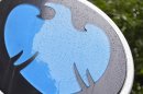 Raindrops are seen on the logo of a Barclays bank in central London