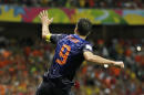 Netherlands' Robin van Persie celebrates after his scoring his side's fourth goal during the second half of the group B World Cup soccer match between Spain and the Netherlands at the Arena Ponte Nova in Salvador, Brazil, Friday, June 13, 2014. (AP Photo/Natacha Pisarenko)