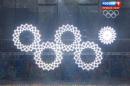 In a combo of frame grabs taken from Russian television, five snowflakes float together in Fisht Stadium during the opening ceremony of the 2014 Winter Olympics in Sochi, Russia, Friday, Feb. 7, 2014. During the live ceremony, the fifth ring failed to fully open to create the Olympics rings. On Russian television, producers inserted footage from a dress rehearsal when all five rings joined together and erupted in pyrotechnics.(AP Photo)