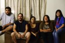 Edgar, Ricardo, Alicia, Lizette and Maria who immigrated from Mexico pose for a portrait at their home in Phoenix, Arizona