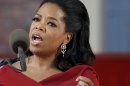 FILE - In this May 30, 2013 file photo, Oprah Winfrey speaks during Harvard University's commencement ceremonies in Cambridge, Mass. Winfrey says she had a racist encounter while shopping in Switzerland _ and the apologetic national tourist office agrees. The billionaire media mogul told the U.S. program 