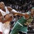 Boston Celtics forward Paul Pierce fouls Miami Heat guard Ray Allen in the first half of their NBA basketball game in Miami, Florida