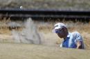 Louis Oosthuizen, of South Africa, hits out of the bunker on the 16th hole during the third round of the U.S. Open golf tournament at Chambers Bay on Saturday, June 20, 2015 in University Place, Wash. (AP Photo/Lenny Ignelzi)
