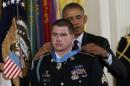 U.S. President Obama presents the Medal of Honor to former Army Sgt. White during White House ceremony in Washington