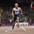 Britain's Peacock wins the men's 100m T-44 final ahead of South Africa's Fourie and Browne of the U.S. in the Olympic Stadium at the London 2012 Paralympic Games