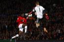 Bayern Munich's Neuer is challenged by Manchester United's Welbeck during their Champions League quarter-final first leg soccer match at Old Trafford in Manchester