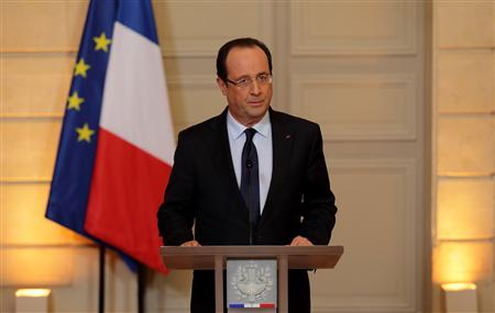 France's President Francois Hollande arrives to deliver a statment on the situation in Mali at the Elysee Palace in Paris, January 11, 2013. REUTERS/Philippe Wojazer