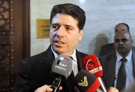 A handout picture released by the Syrian Arab News Agency (SANA) on April 29, 2013, shows Syrian Prime Minister Wael al-Halqi giving a press conference following a cabinet meeting in Damascus