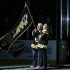 William and Patricia Campbell, parents of Krystle Campbell, who was killed in the Boston Marathon bombings, wave a "Boston Strong" banner before Game 4 in the Eastern Conference finals of the NHL hockey Stanley Cup playoffs between the Boston Bruins and the Pittsburgh Penguins, in Boston on Friday, June 7, 2013. (AP Photo/Elise Amendola)