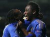 Chelsea's Moses celebrates with team mate John Obi Mikel after scoring a goal during their Champions League Group E soccer match against Shakhtar Donetsk at Stamford Bridge in London