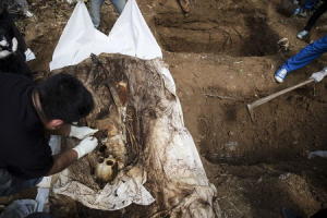Malaysia finds 139 graves at cruel jungle trafficking camps.