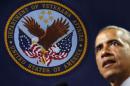 The emblem for the U.S. Department of Veteran's Affairs is seen as U.S. President Barack Obama speaks at Ft. Belvoir, Virginia
