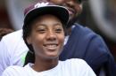FILE - In this Aug. 24, 2014, file photo, Taney Dragons' Mo'ne Davis smiles as her team is greeted by fans and city officials during their return to Philadelphia after the Little League World Series. The Little League sensation is heading to the WNBA conference finals in Minnesota on Sunday, Aug. 31. She'll sit with WNBA president Laurel J. Richie and meet both teams, including former UConn stars Diana Taurasi and Maya Moore before the game starts.(AP Photo/Joseph Kaczmarek, File)