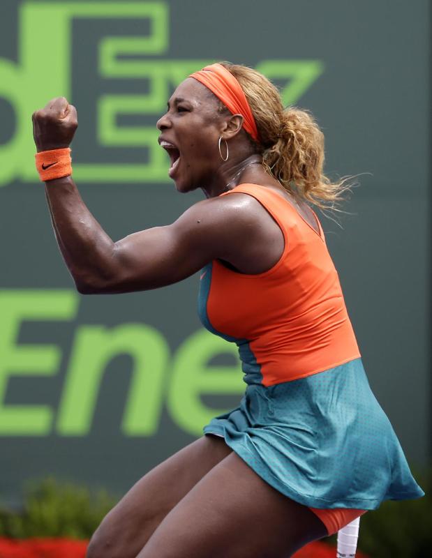 Serena Williams pumps her fist after winning the first set against Li Na, of China, during the final at the Sony Open Tennis tournament, Saturday, March 29, 2014, in Key Biscayne, Fla