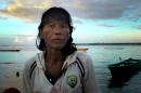 This Friday, Nov. 28, 2014 image shows Ngwe Thein, 42, who has been living on an island near Benjina, Indonesia for three years, after being forced to work on a fishing trawler with inadequate food and little or no pay, he said. In the wake of an AP report on fishermen who were enslaved, on Thursday, March 26, 2015, Thai lawmakers voted unanimously to create tougher penalties for violating the country's anti-human trafficking law, including the death penalty. But in a Thursday email, Phil Robertson, deputy director of Human Rights Watch's Asia division said, "The Thailand government has made repeated verbal commitments to get tough with traffickers but every time real follow-up has been lacking." In the meantime, Thein is one of the thousands of men who are waiting. (AP Photo/APTN, Esther Htusan)