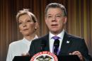 Colombian president Juan Manuel Santos, pictured with his wife Maria Clemencia Rodriguez on October 7, 2016, will donate his Nobel Peace Prize money to victims of his country's conflict